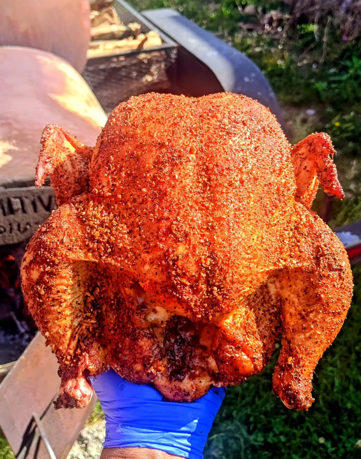 Whole dry-rubbed smoked chicken